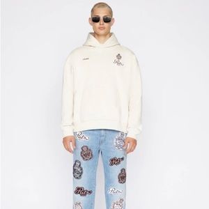 Frame x Ritz Paris Unisex Hoodie in Cream size XS.